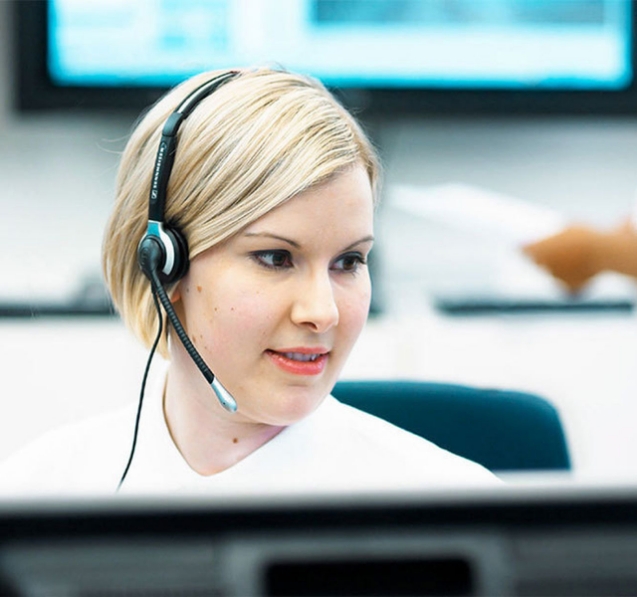 Protectas telephonist behind a security screen